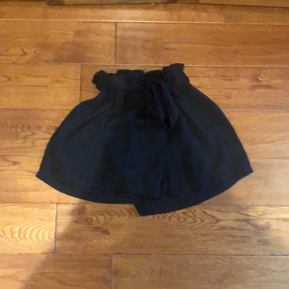 black shorts with tie and bow
